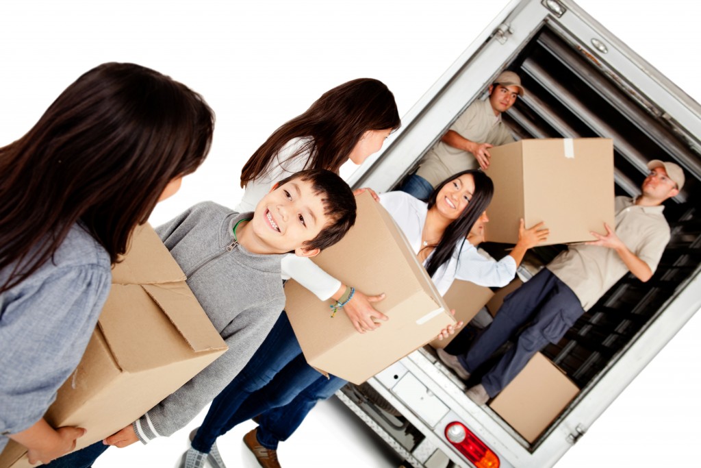 people moving boxes