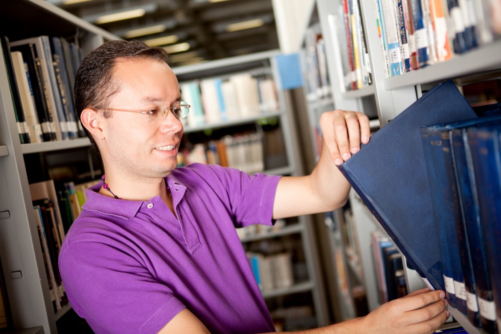 man in library
